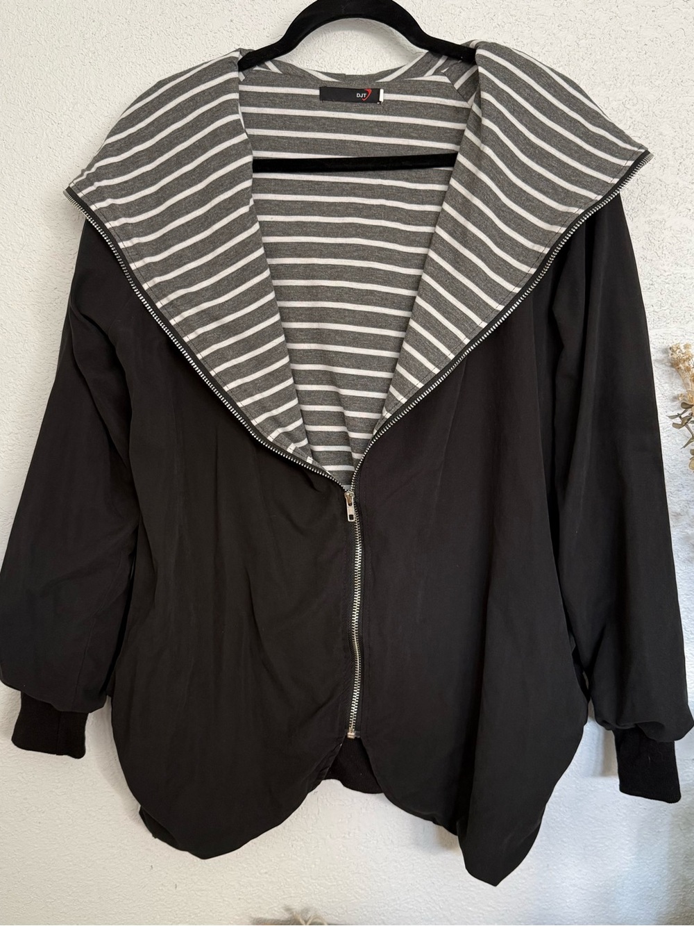 Black Zip-Front Jacket with Grey Striped Hood Lining